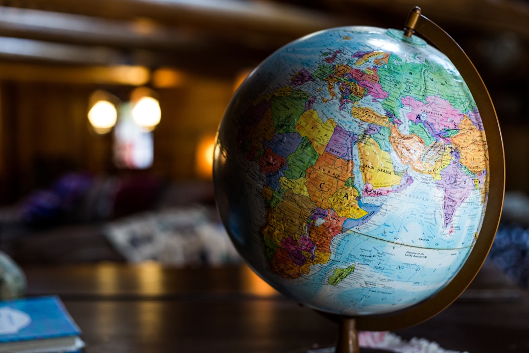 Close-up of a globe showcasing various countries and continents